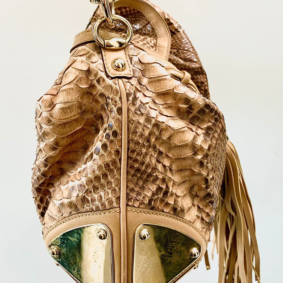 Close-up of Gucci hobo bags hardware and fine stitching