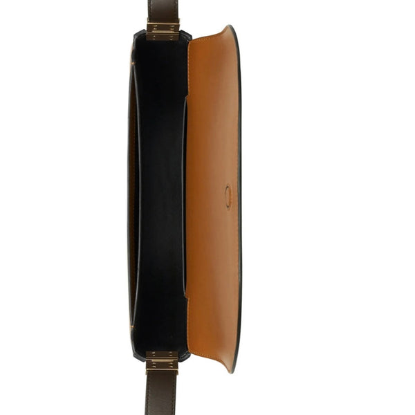 Close-up of Burberry handbags hardware and fine stitching