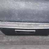 Close-up of Classic bags hardware and fine stitching