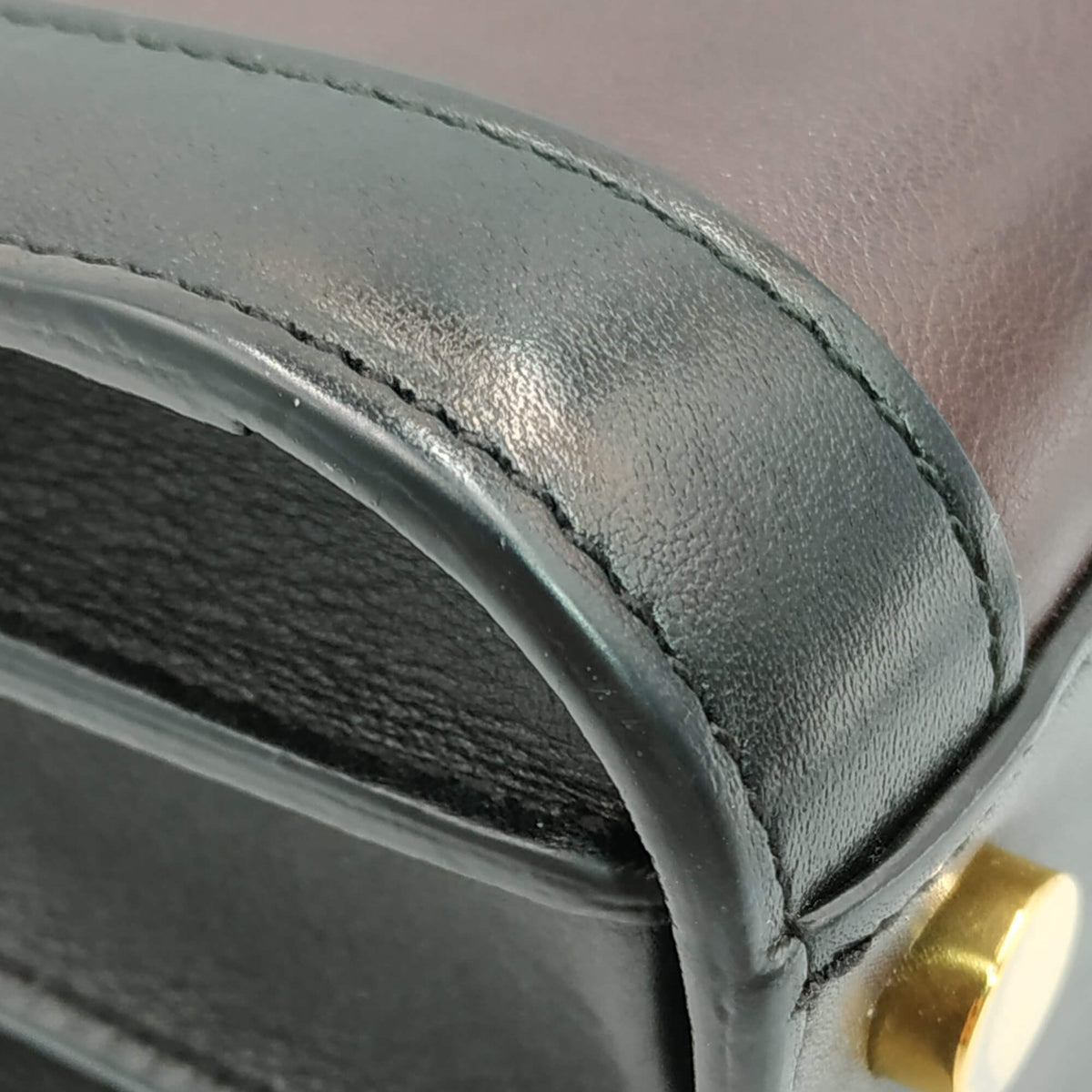 Close-up of Classic bags hardware and fine stitching