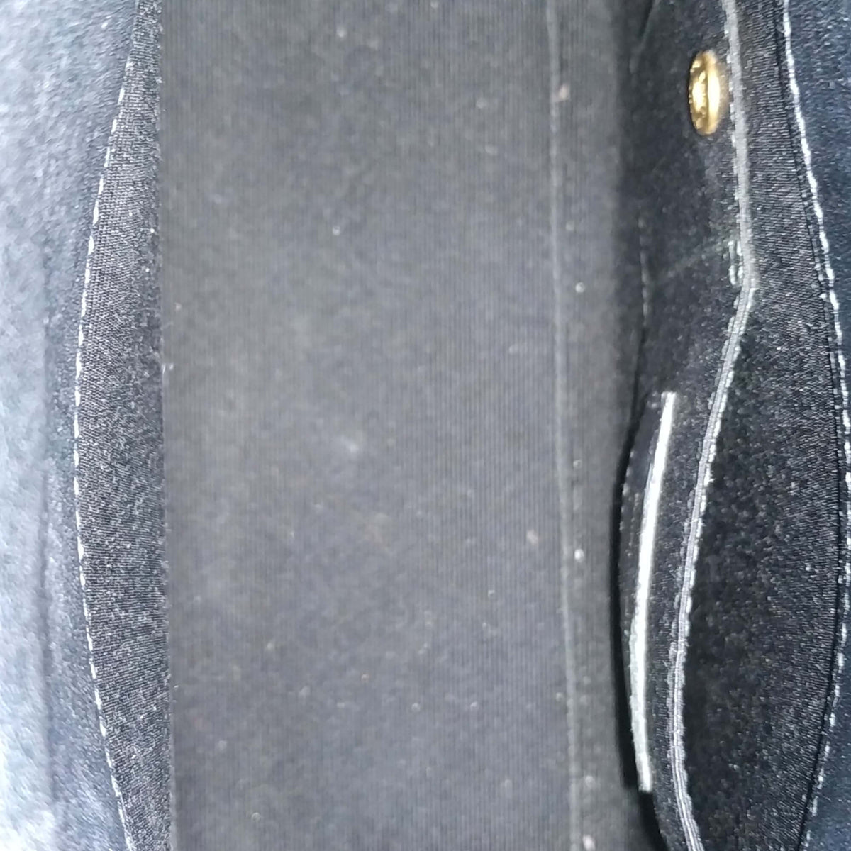 Close-up of Classic bags hardware and fine stitching