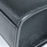 Close-up of Monogram bags hardware and fine stitching