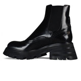 Close-up of Alexander McQueen boots & booties hardware and fine stitching