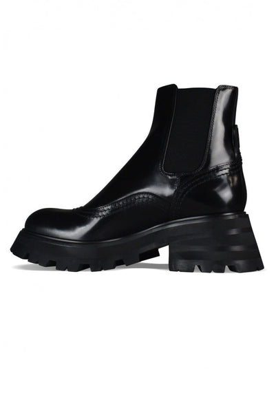 Close-up of Alexander McQueen boots & booties hardware and fine stitching