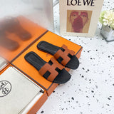 Hermes sandals Style 153 - front view, statement logo accent