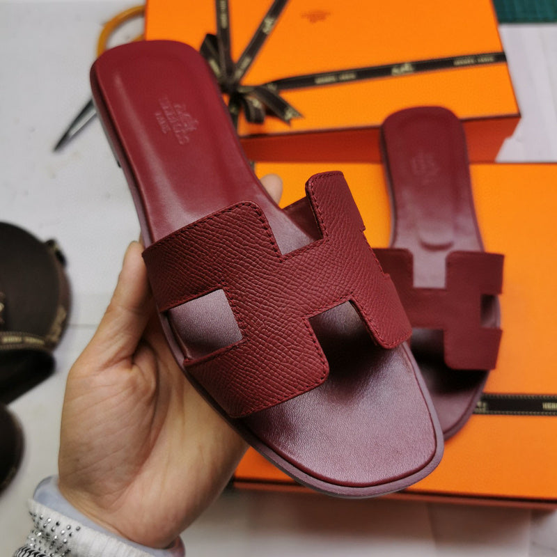 Hermes sandals Style 026 - front view, iconic logo design