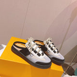 Louis Vuitton Black Pointed-Toe Flats - Toe Detail View