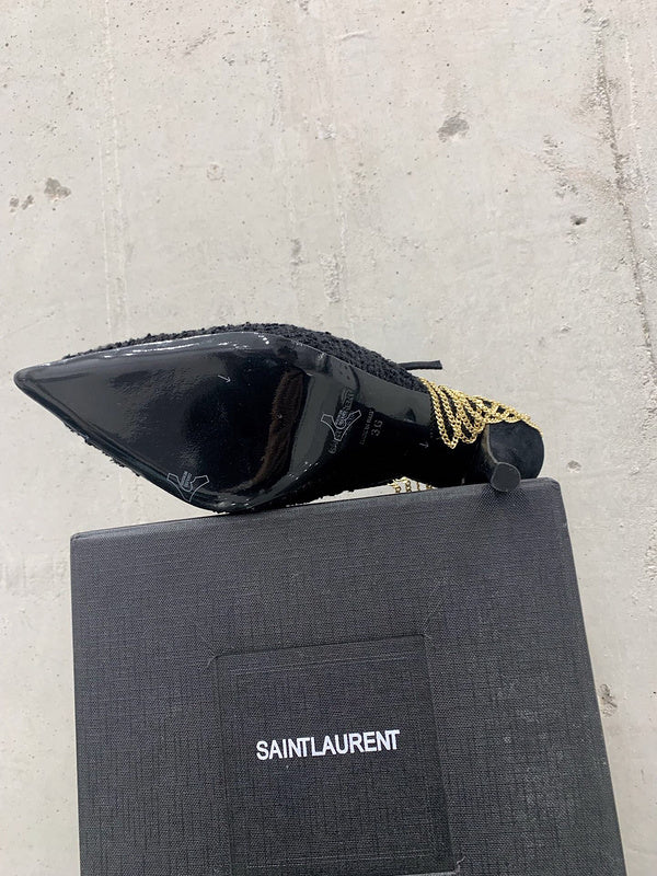 Side profile view of Saint Laurent luxury piece style No.021