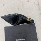 Side profile view of Saint Laurent luxury piece style No.021