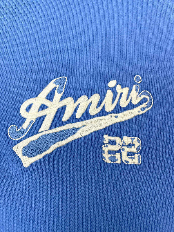 Three-quarter angle view of Amiri luxury piece style No.115