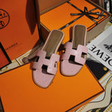 Hermès Burgundy Crisscross Strap Sandals - Lifestyle Styling Shot