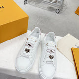 Louis Vuitton Nude Slip-On Sneakers - Side Profile View
