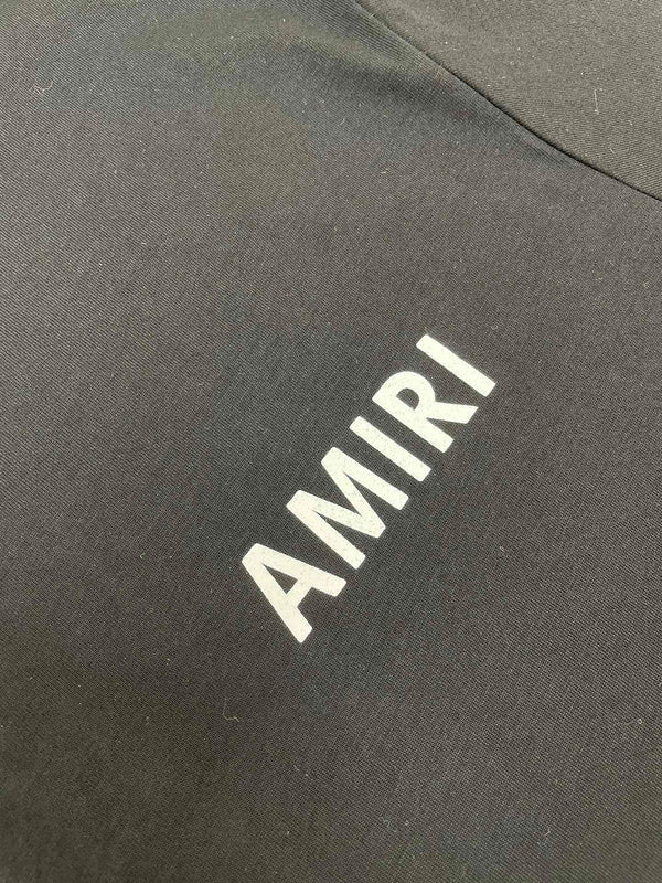 Three-quarter angle view of Amiri luxury piece style No.154