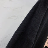 Close-up of Balenciaga designer clothing craftsmanship