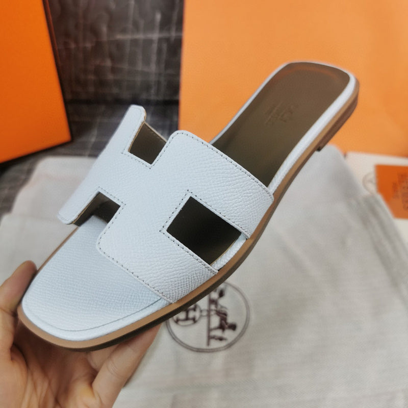 Hermes sandals Style 108 - styled lifestyle view