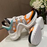 Louis Vuitton White Slip-On Sneakers - Close-Up Texture View