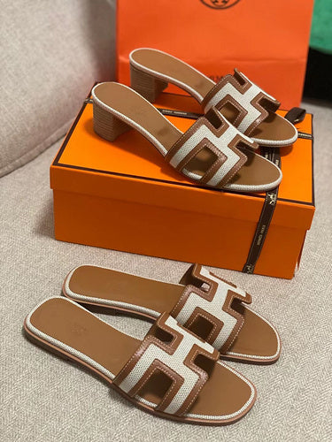 Hermès Grey Block Heel Sandals - Angled View
