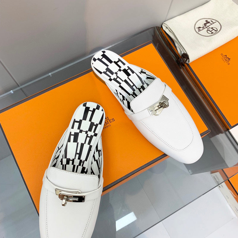 Hermès White Slide Sandals - Heel Detail View