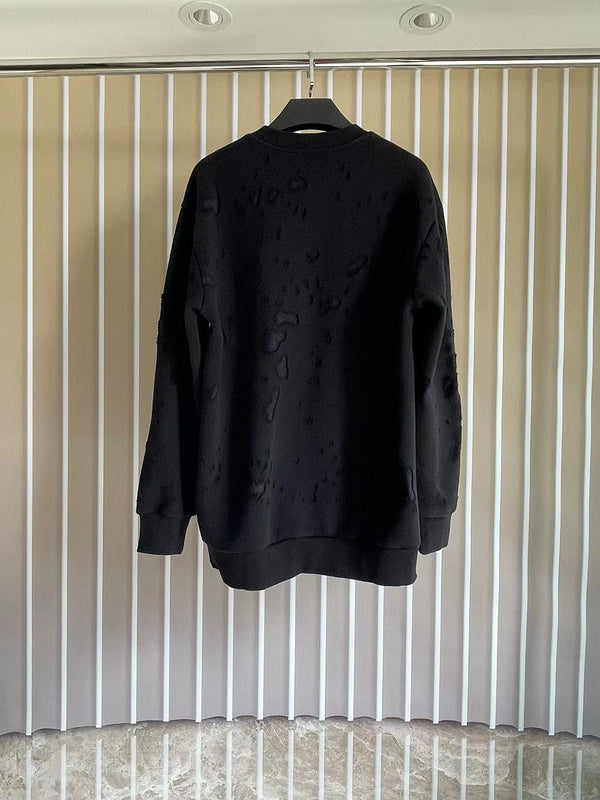 Close-up detail view of Givenchy luxury piece style No.107
