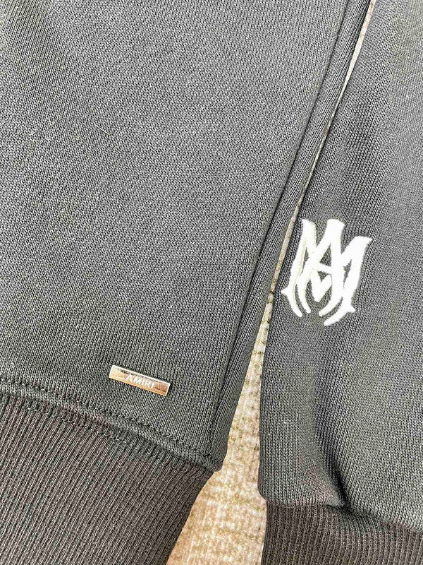 Texture and finish detail of Amiri luxury piece style No.035