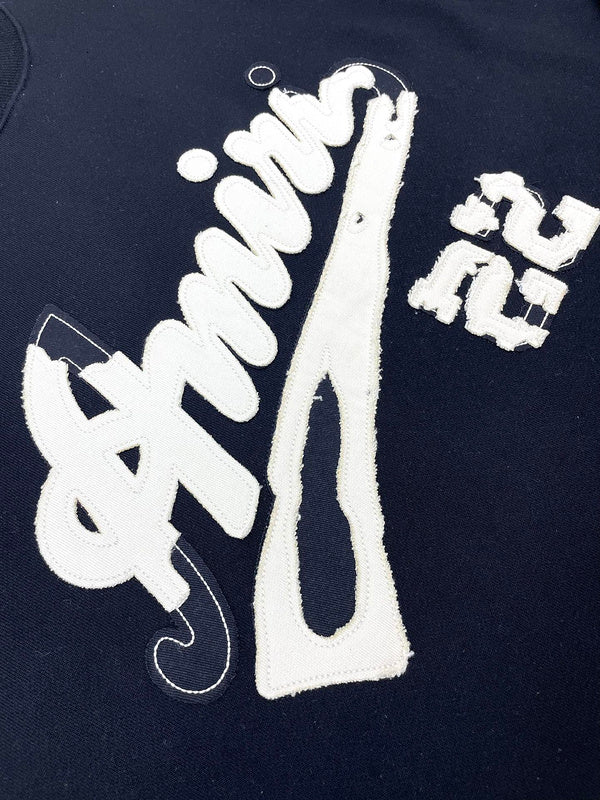 Three-quarter angle view of Amiri luxury piece style No.110