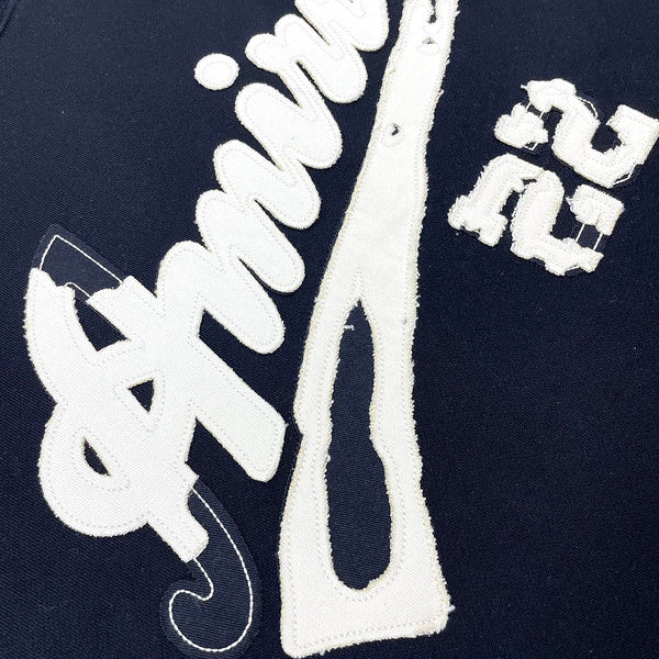 Three-quarter angle view of Amiri luxury piece style No.110