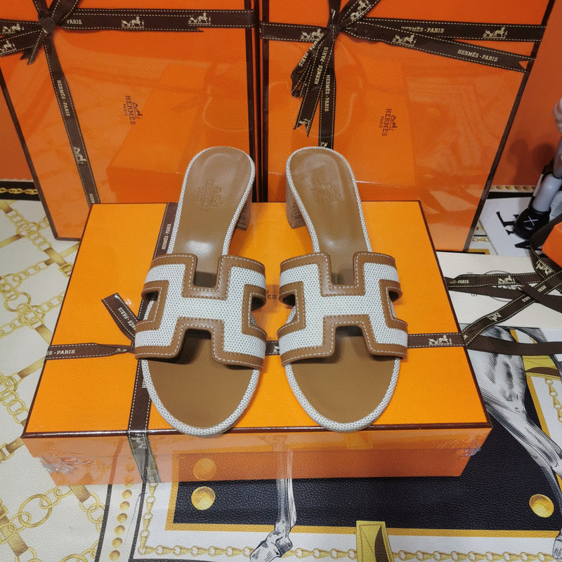 Hermès White Slide Sandals - Angled View