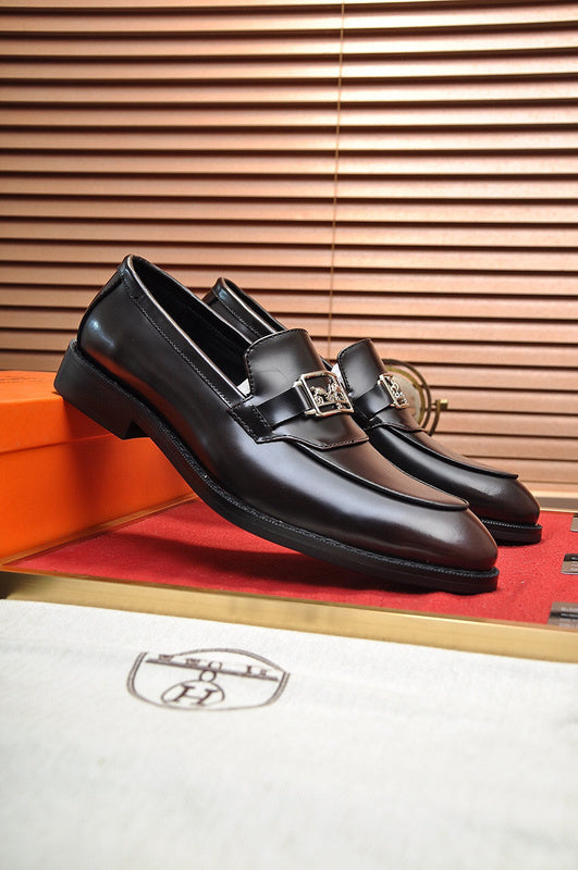 Hermes shoes Style 057 - close-up of iconic logo design
