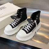 Alexander McQueen White Chunky Platform Sneakers - Sole Detail View