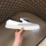 Hermès Red Low-Top Sneakers - Close-Up Texture View