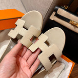 Hermès Tan Crisscross Strap Sandals - Angled View
