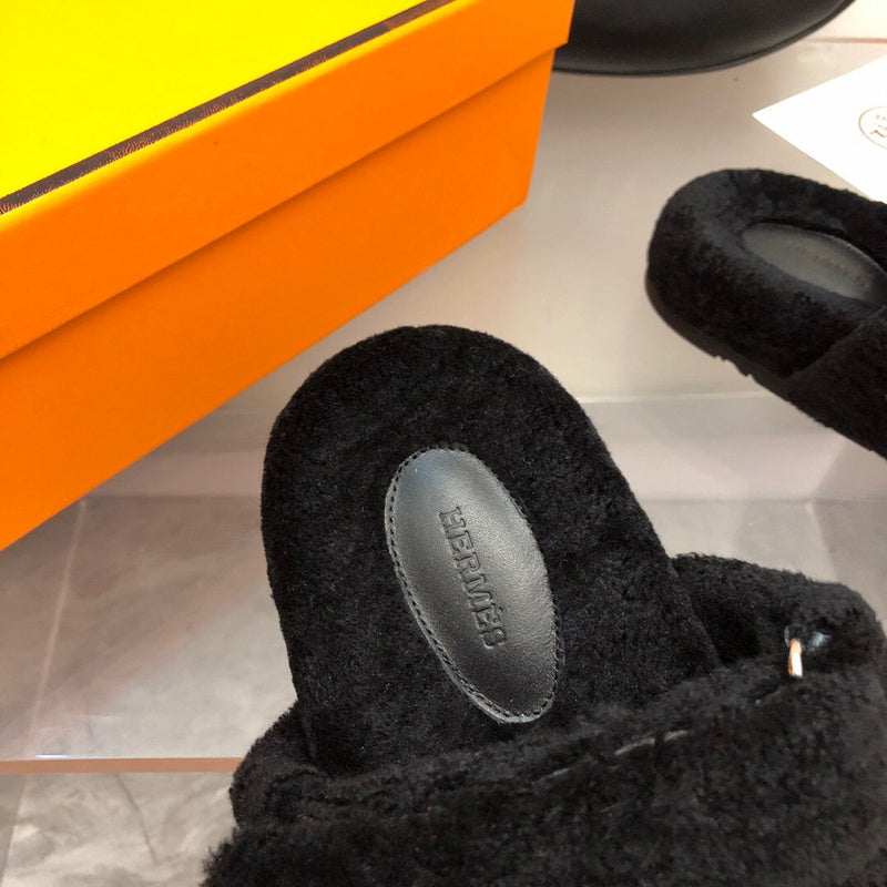 Hermès Black Ankle Boots - Angled View