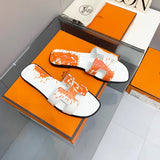 Hermès Tan Slide Sandals - Heel Detail View