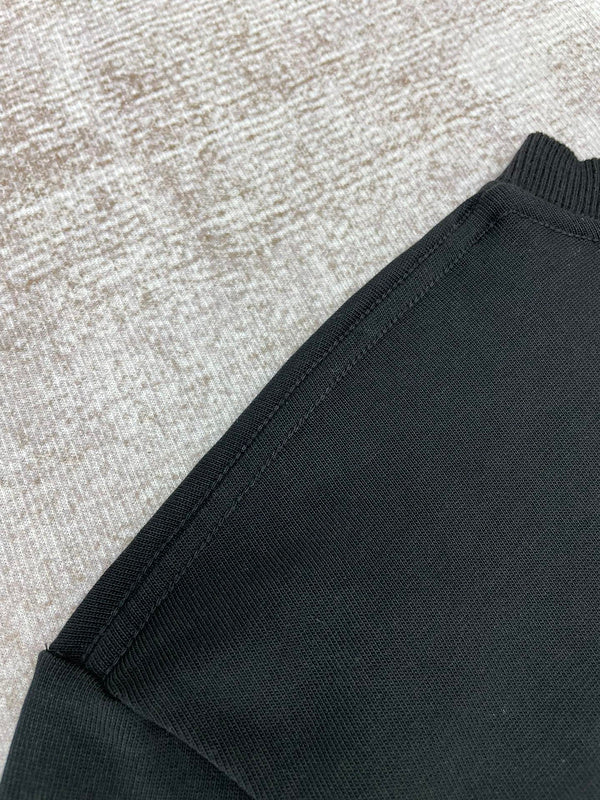 Side profile view of Amiri luxury piece style No.064