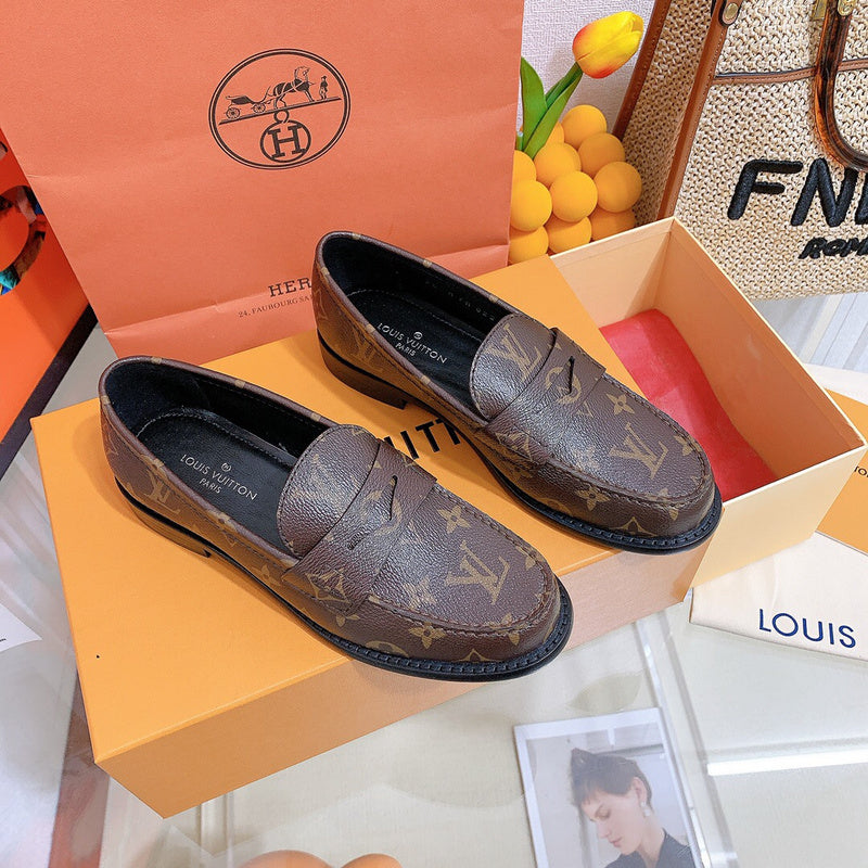 Louis Vuitton Beige Loafer Flats - Angled View