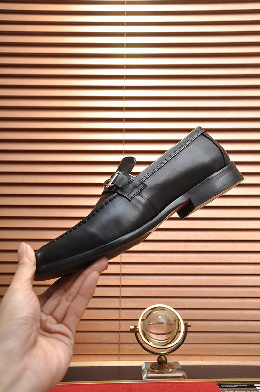 Hermes shoes Style 066 - close-up of statement logo accent