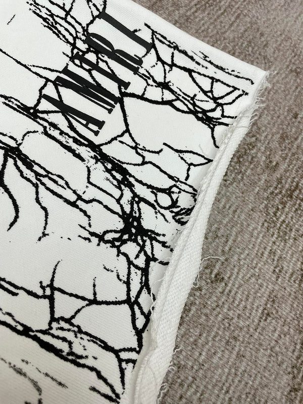 Three-quarter angle view of Amiri luxury piece style No.078