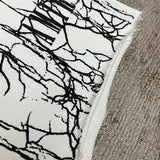 Three-quarter angle view of Amiri luxury piece style No.078