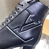 Louis Vuitton Tan Pointed-Toe Flats - Angled View