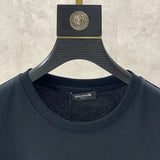 Close-up of Balmain designer clothing craftsmanship