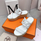 Hermes shoes Style 307 - close-up of iconic logo design