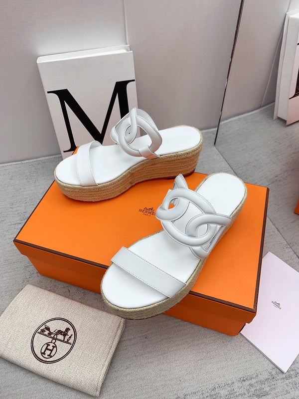 Hermès White Ankle Strap Heels - Angled View