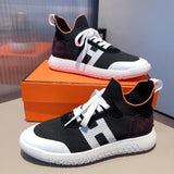 Hermès Burgundy Chunky Platform Sneakers - Detail Shot of Craftsmanship
