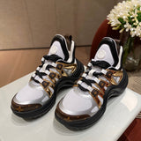 Louis Vuitton Beige Ankle Strap Heels - Angled View