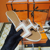 Hermès White Slide Sandals - Full Silhouette View