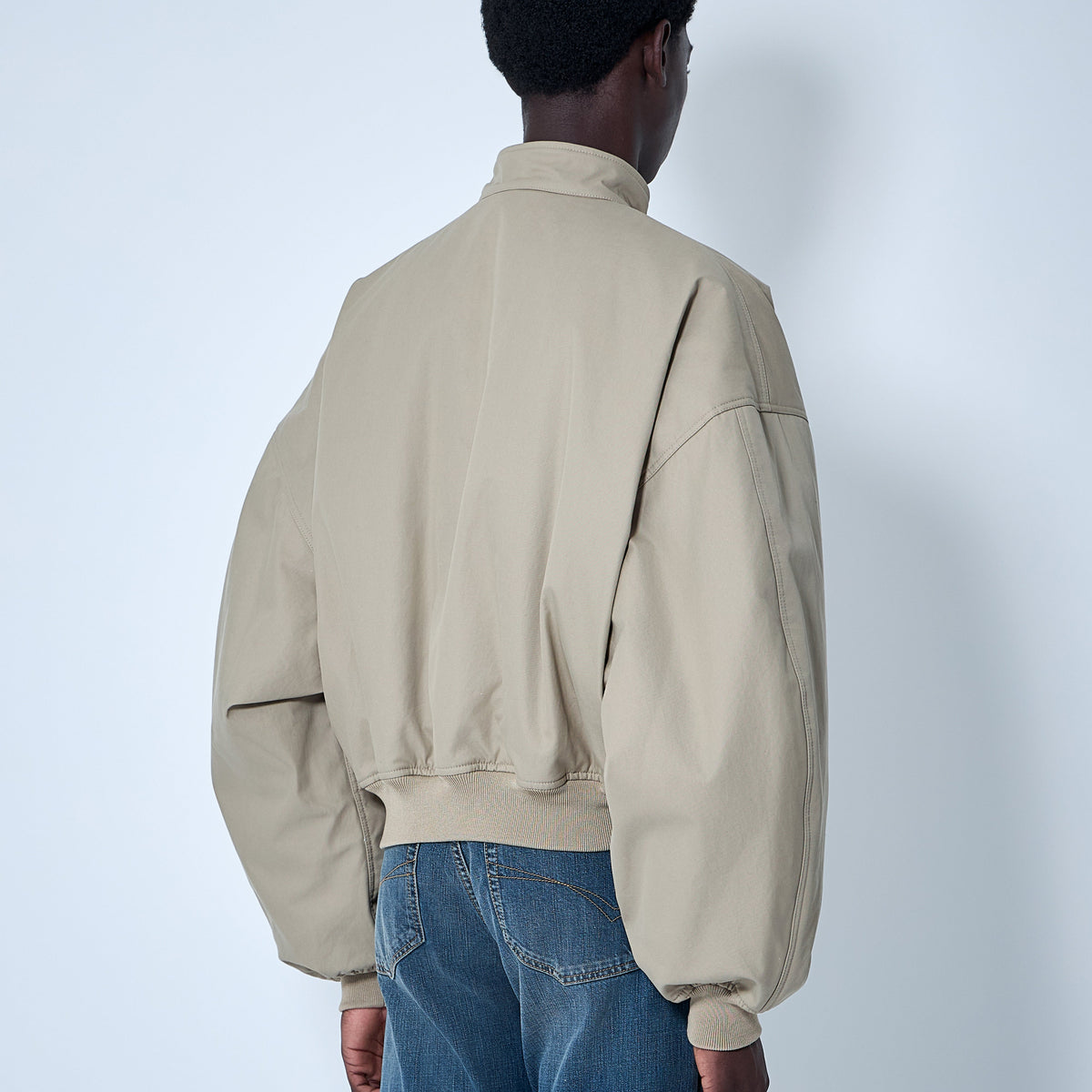 Close-up of Balenciaga jackets hardware and fine stitching
