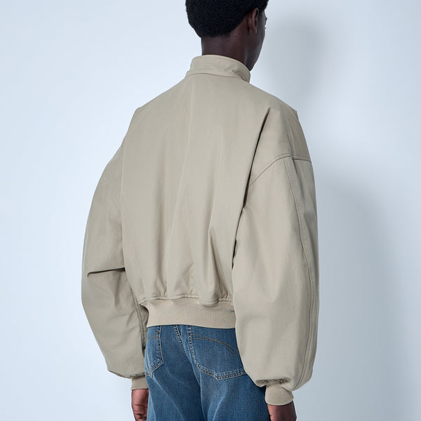 Close-up of Balenciaga jackets hardware and fine stitching