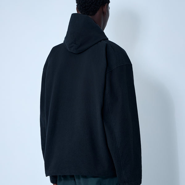 Close-up of Balenciaga jackets hardware and fine stitching