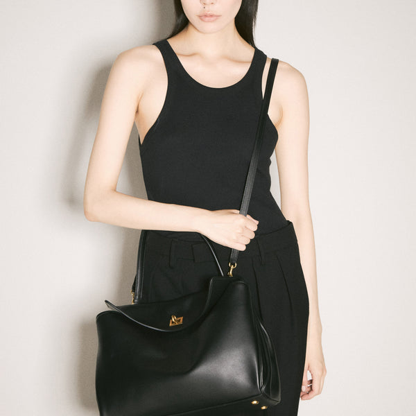 Balenciaga cross body bags lifestyle shot premium designer piece