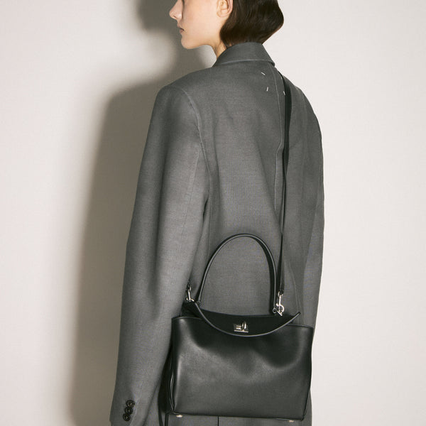 Balenciaga cross body bags lifestyle shot premium designer piece